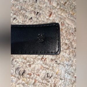 this belt has been barely worn has a couple of holes in it so it would fit me!